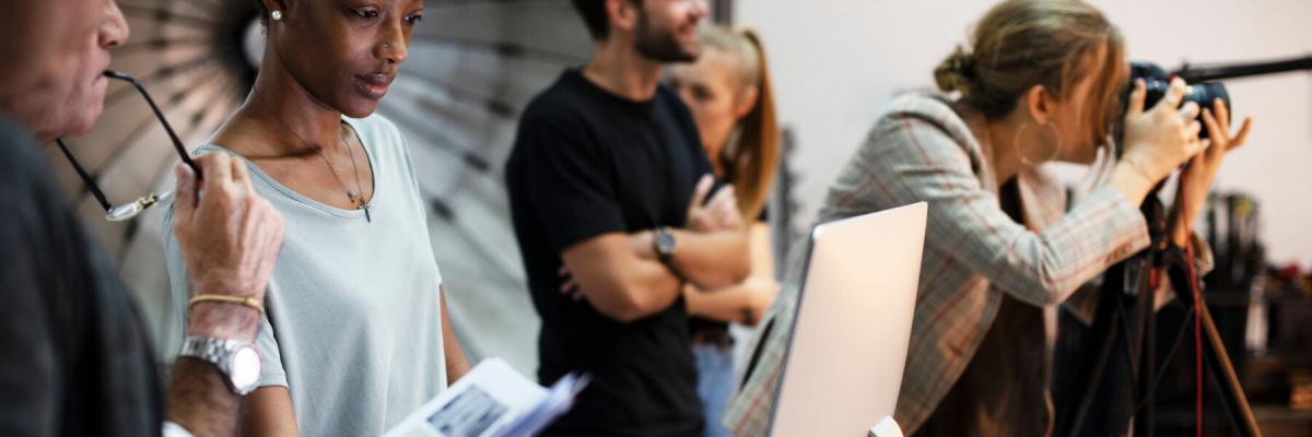 Art director checking photographer's work on a monitor